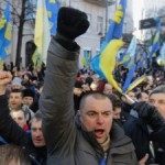 Protestors in Kiev raise their fists