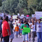 protesters march in Ferguson