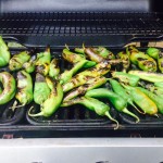 Green Chiles roasting on a grill