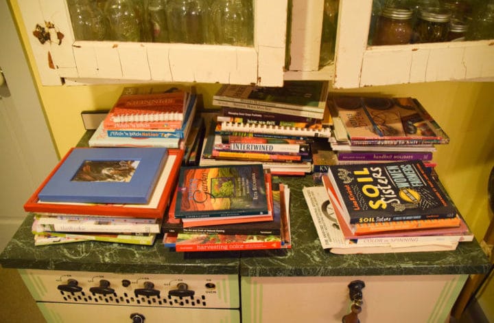 Shelf with books on farming